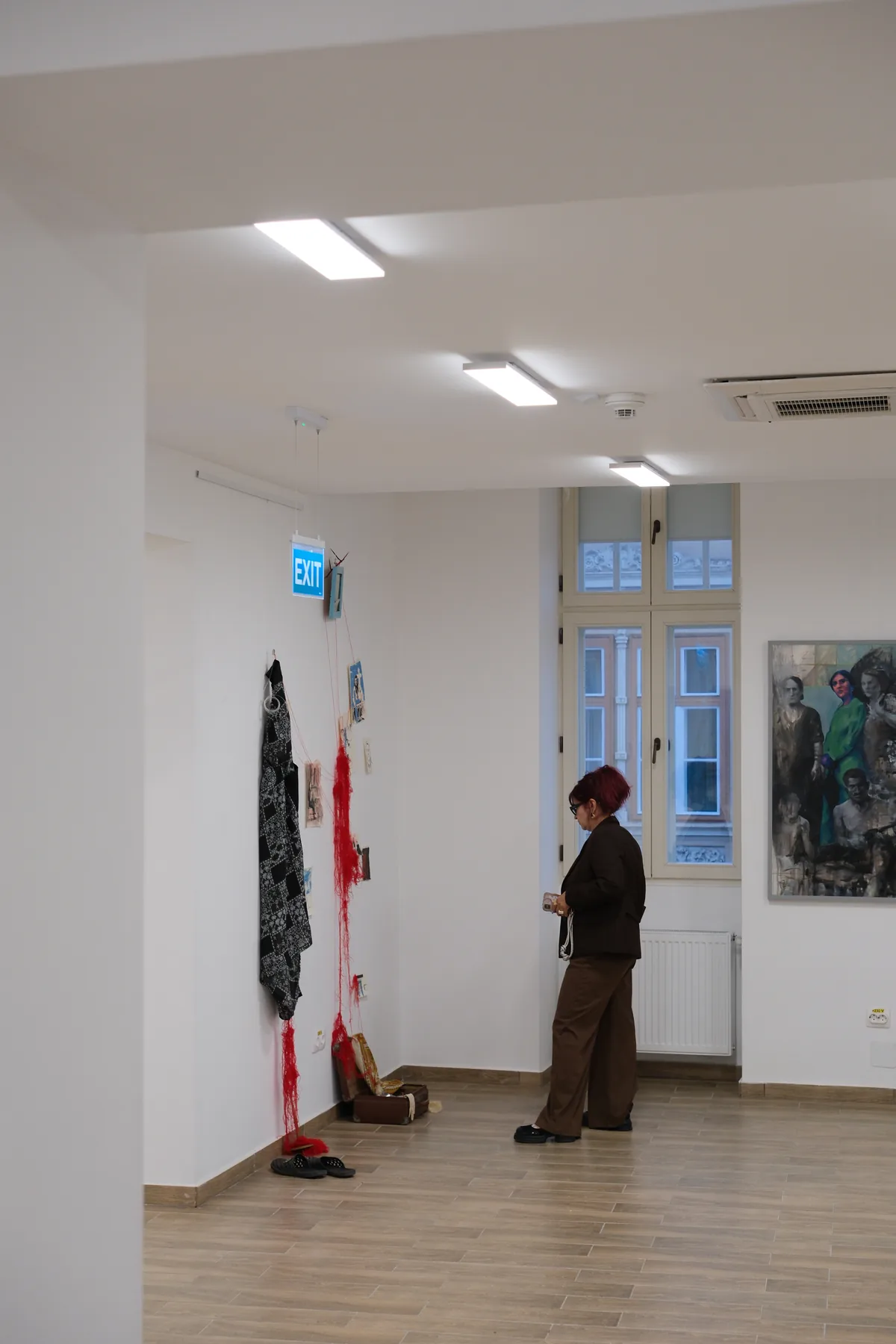 Architectural view of the installation and viewer in the gallery space