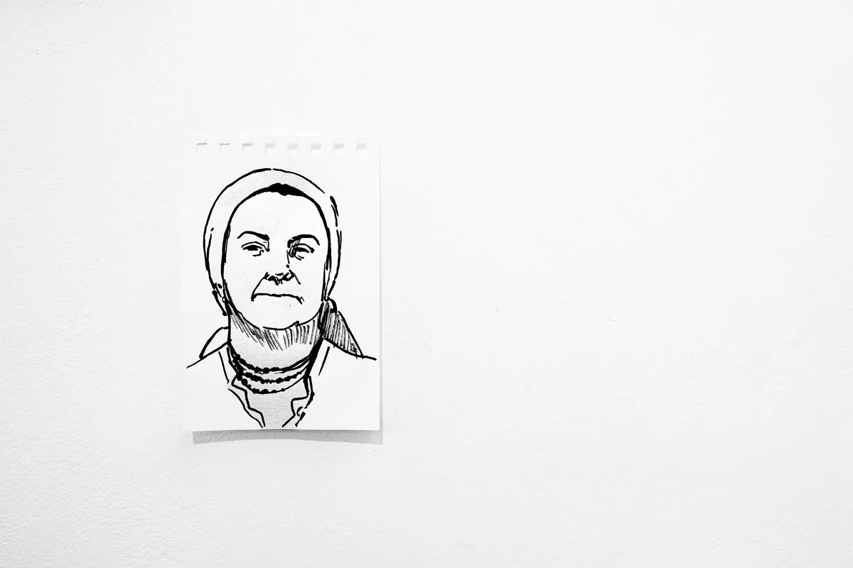 Minimalist ink portrait drawing of Mamaia Vasilica on textured paper